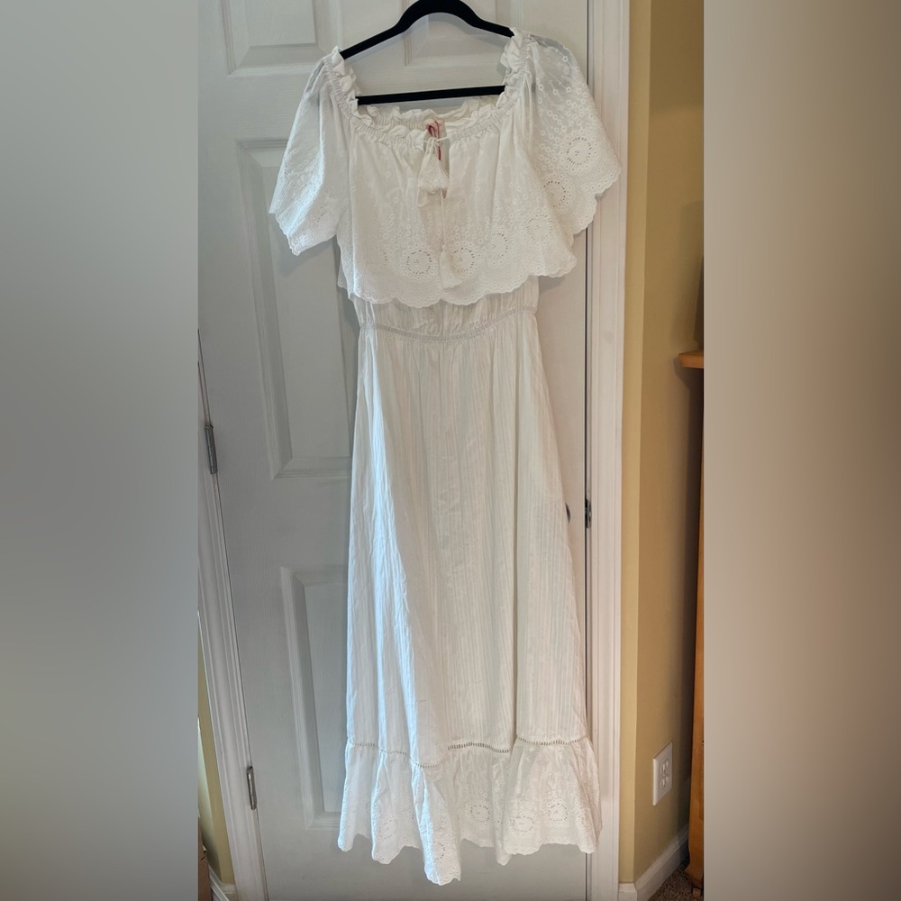 Full length white dress by Solitaire